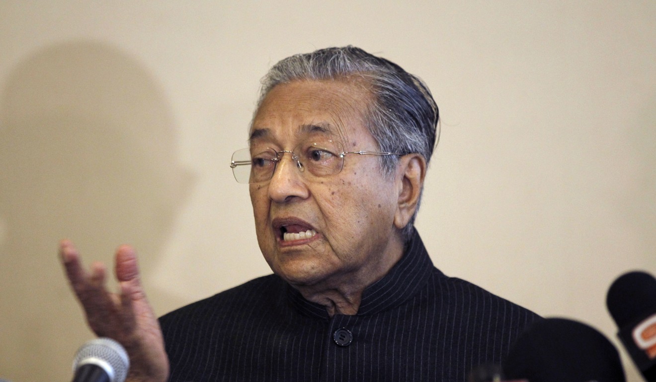 Malaysia's former Prime Minister Mahathir Mohamad speaks in Putrajaya, Malaysia. Some question whether the Mahathir-helmed opposition to Prime Minister Najib Razak is being undly influenced by religious conservatives. Photo: AP