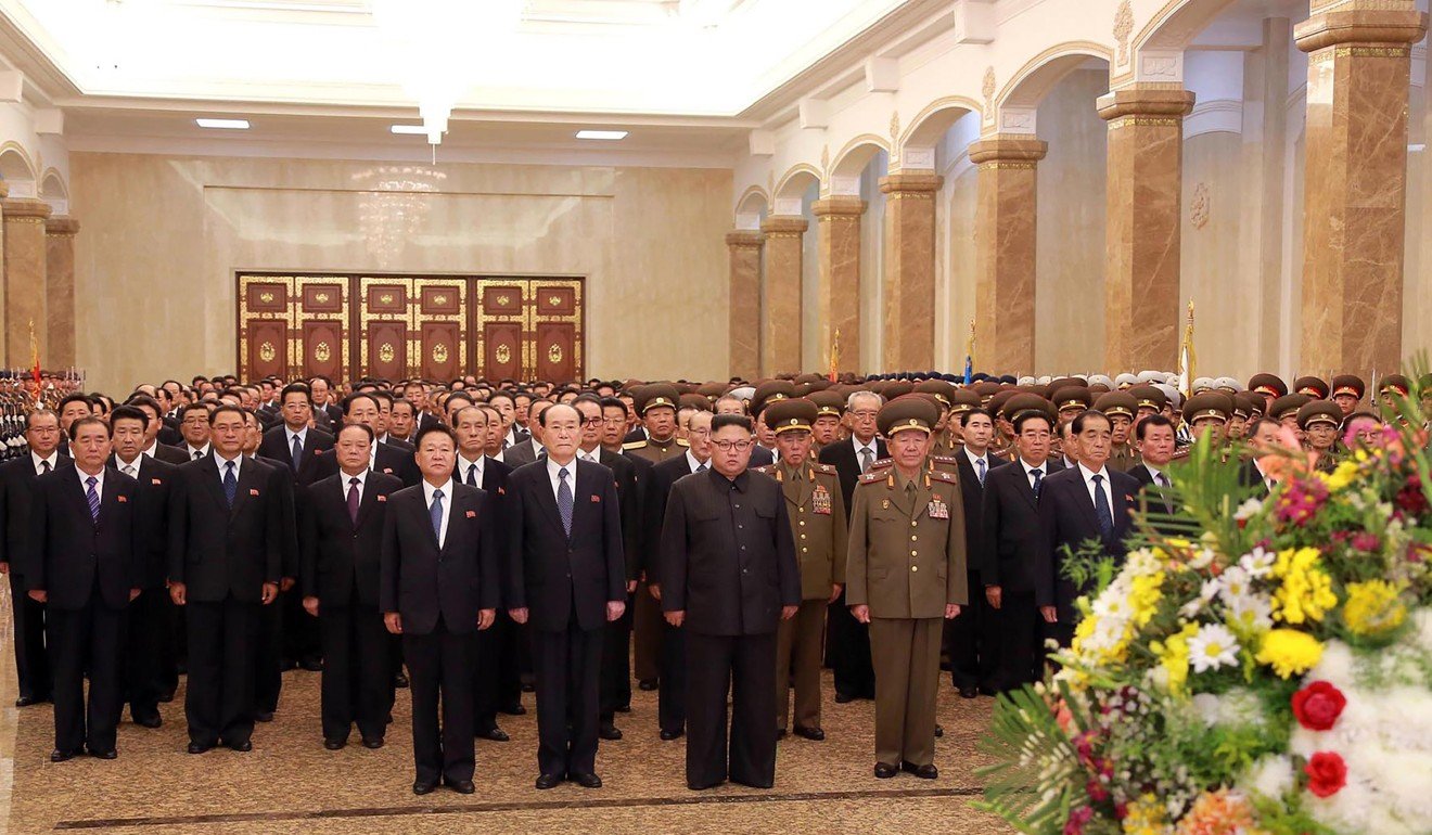 This photo taken on Saturday shows North Korean leader Kim Jong-un (centre) and participants in the Second Plenum of the 7th Central Committee of the Workers' Party of Korea (WPK) visiting the Kumsusan Palace of the Sun in Pyongyang.Photo: AFP