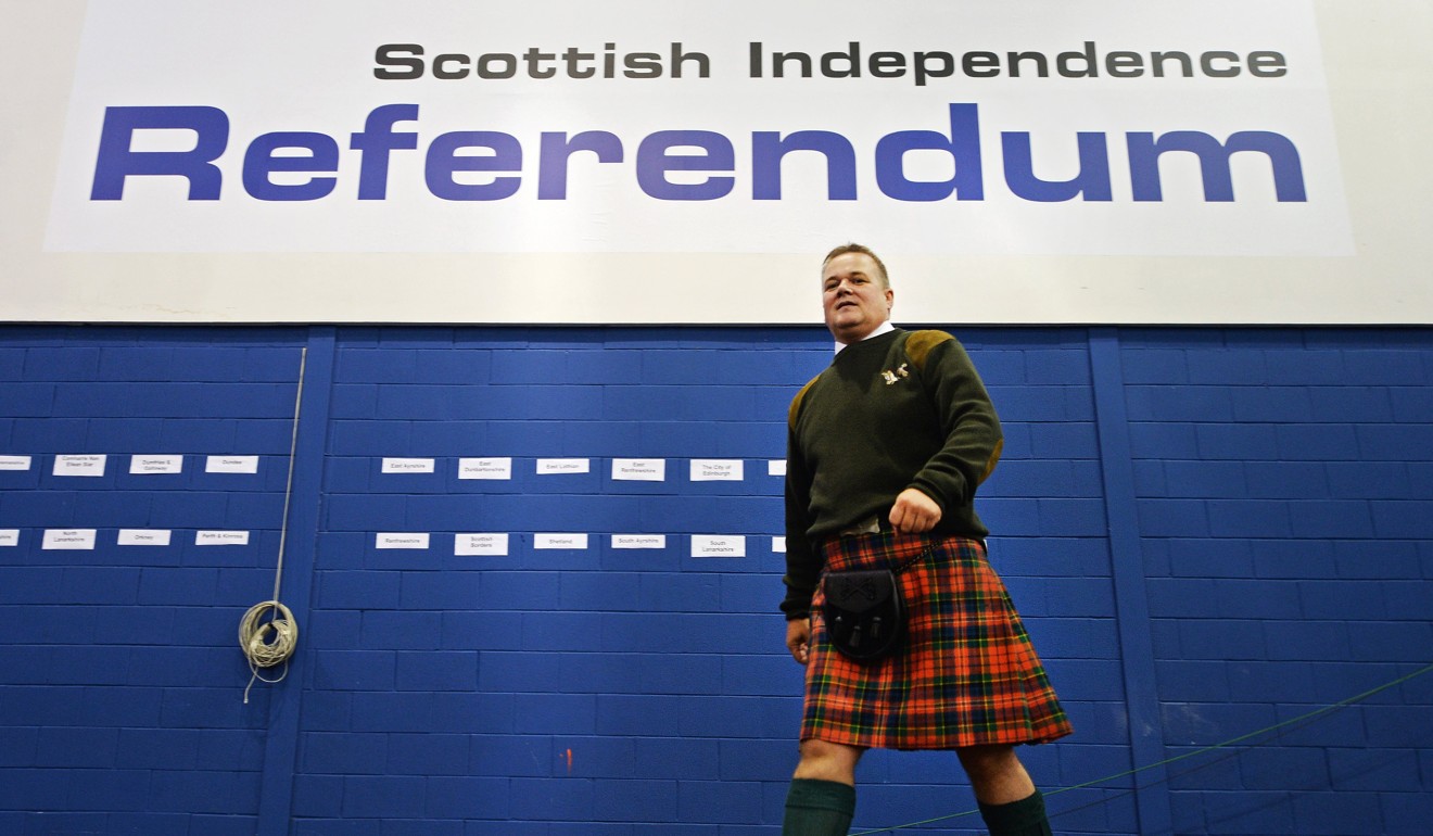 A Scotsman wearing a traditional kilt during the Scottish referendum in Edinburgh. Photo: EPA