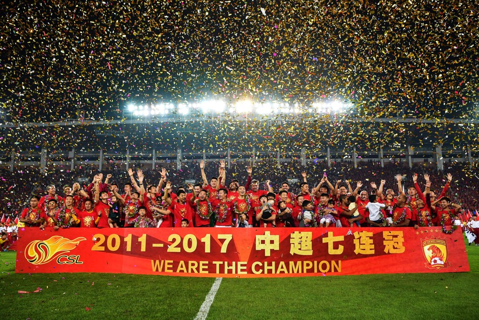 Guangzhou Evergrande celebrate after winning the Chinese Super League. Photo: AFP