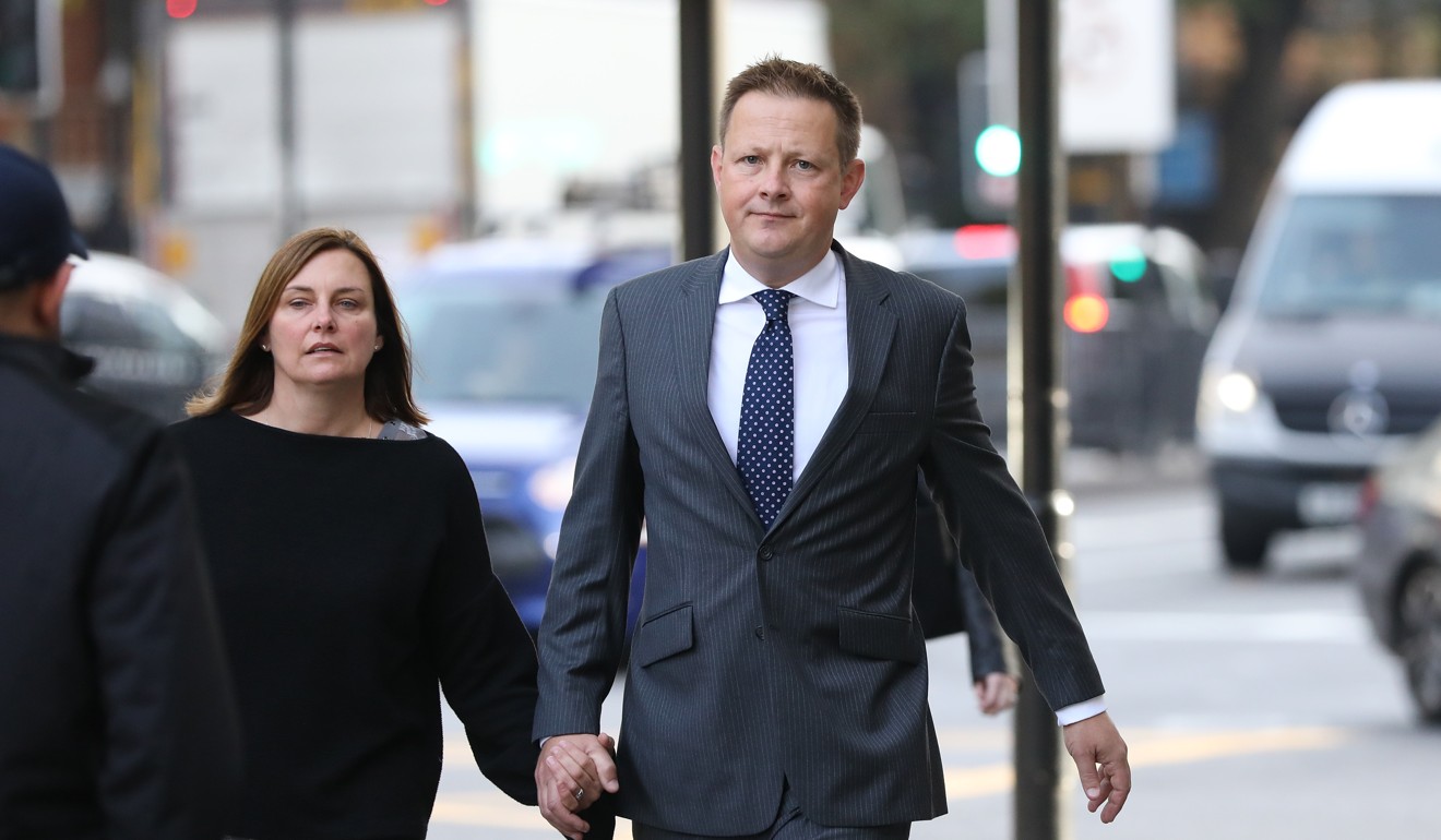 Stuart Scott, former head of currency trading for Europe at HSBC Holdings Plc, right, arrives at Westminster Magistrates' Court in London. Scott is fighting extradition to the US. Photo: Bloomberg