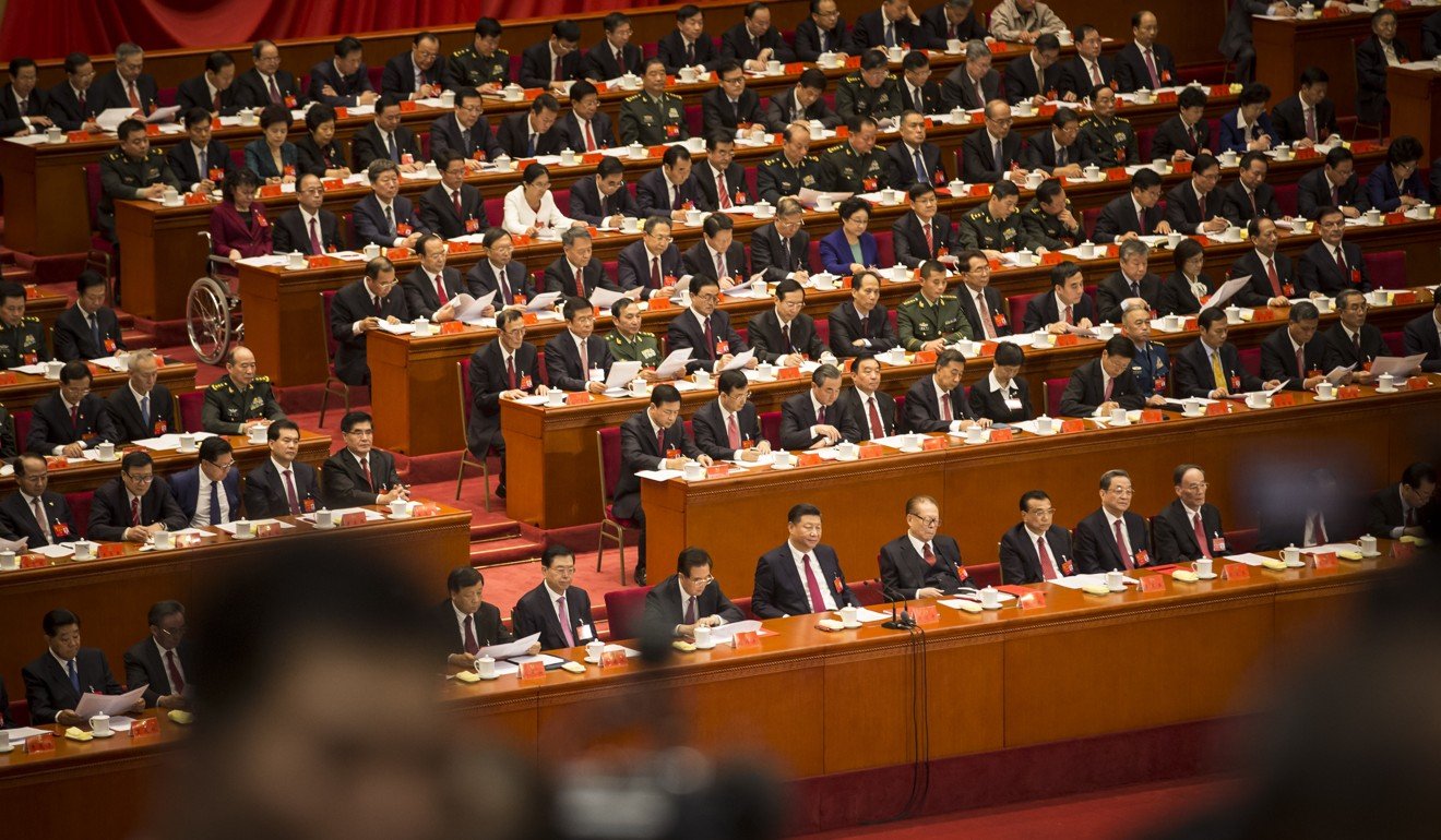 Xi Jinping and other leaders and delegates attend the closing session of the 19th National Congress of the Communist Party of China at the Great Hall of the People in Beijing, on Tuesday. Photo: Bloomberg