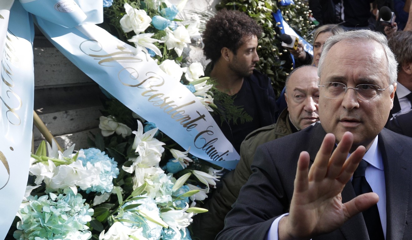 Lazio president Claudio Lotito gives a statement to the press after laying a wreath outside a synagogue in Rome. Photo: AP