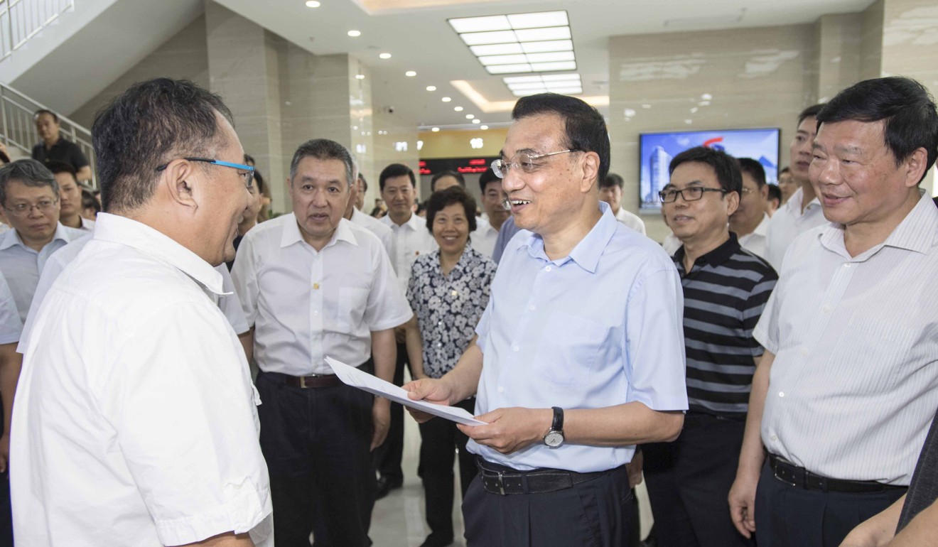 Li Keqiang visits the Yangling pilot free-trade zone in Shaanxi, northwest China, in July. Photo: Xinhua.