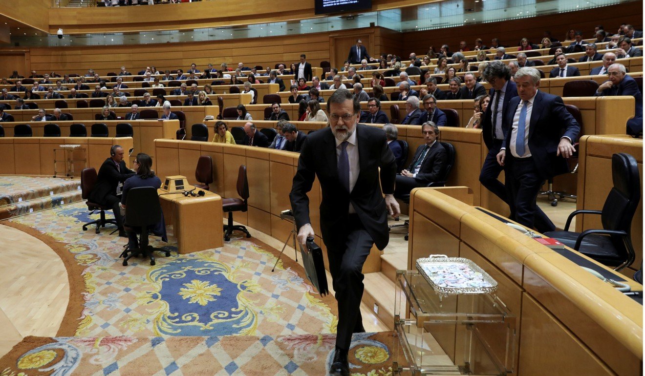 Spain’s Prime Minister Mariano Rajoy leaving his seat during a debate at the upper house Senate in Madrid. Photo: Reuters