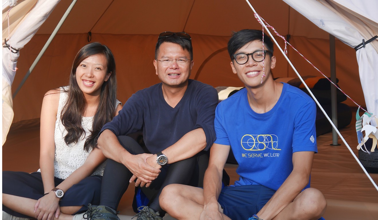 YHA chief executive Terence Lee (centre) with Dorothy Fung and Cogent Chan at the Youth Hostel Association (YHA) Ngong Ping campsite on Lantau. Photo: Stuart Heaver