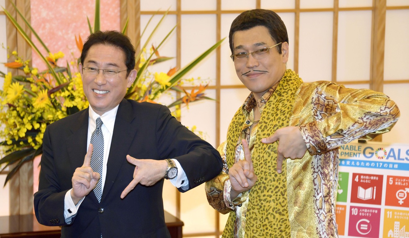 Japanese Foreign Minister Fumio Kishida (left) and Piko Taro. Photo: Kyodo