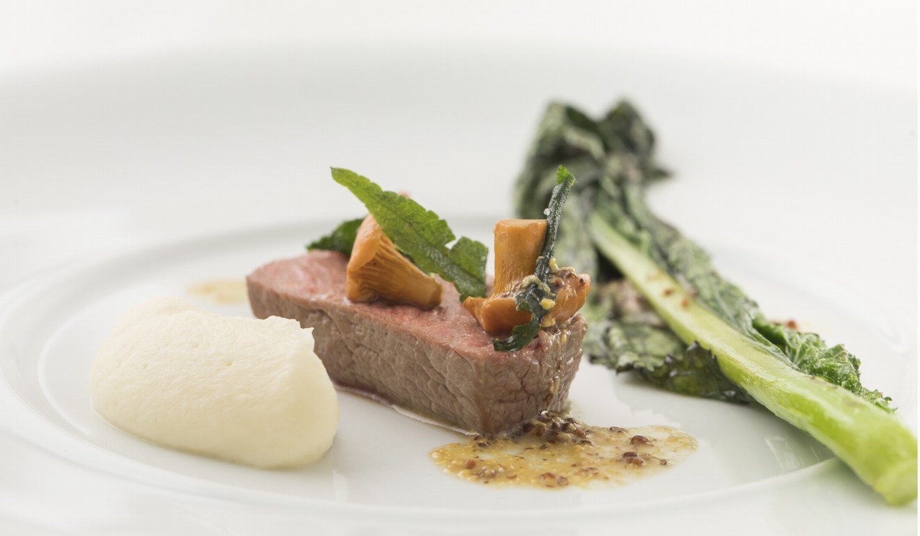 Sugizaki’s hot dish of roasted lamb saddle with seared purple mustard leaf, pickled chanterelles and mustard sauce.
