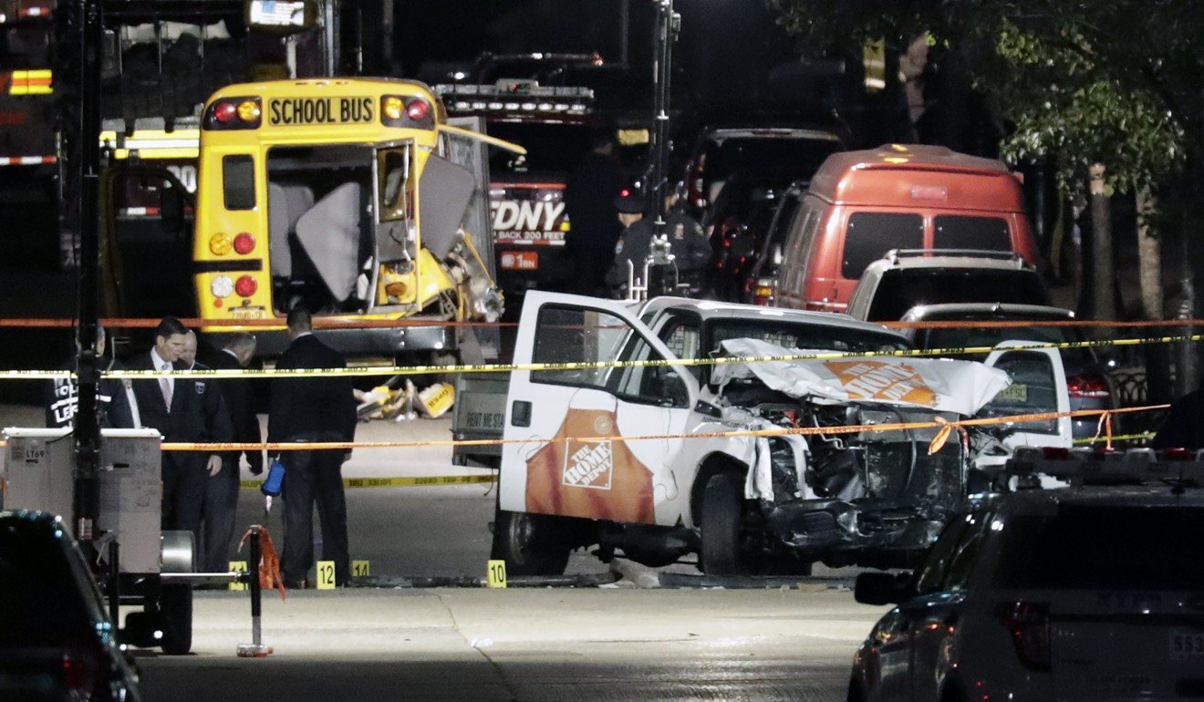 Authorities investigate the pickup truck and scene of a terror attack in downtown New York. Photo: EPA