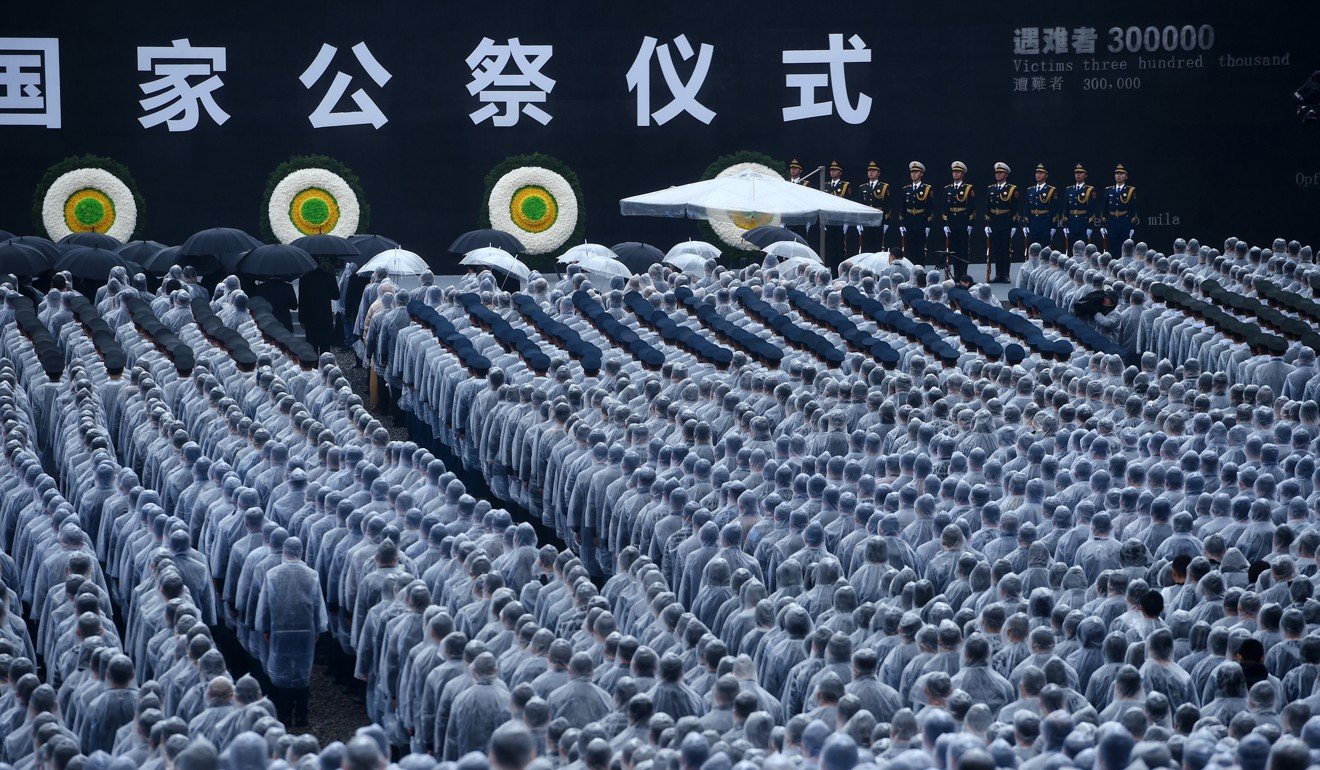A state memorial ceremony for the Nanking massacre at a monument to the victims, in the city in east China’s Jiangsu province, last December 13. The figure in the top right corner is the estimated number of Chinese killed by the Japanese occupation forces. Photo: Xinhua