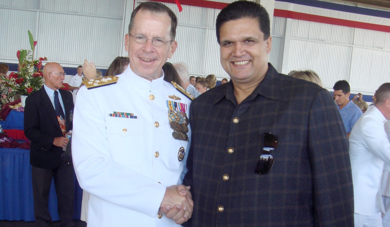 A 2007 photograph of Admiral Mike Mullen with Leonard Glenn Francis. Photo: The Washington Post.