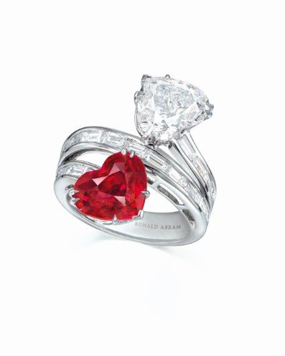 A 6.73ct diamond and ruby heart shape twin ring by Ronald Abram.