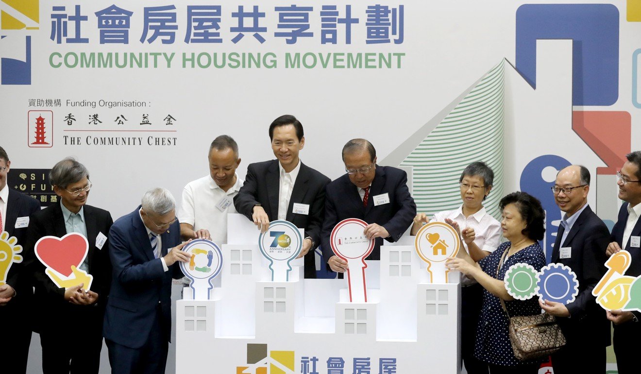 Hong Kong Council of Social Service chair Bernard Chan officiates at the NGO’s launch of a shared-housing project, on September 19. The scheme will provide cheap flats for poor families waiting for public housing. Photo: Edward Wong