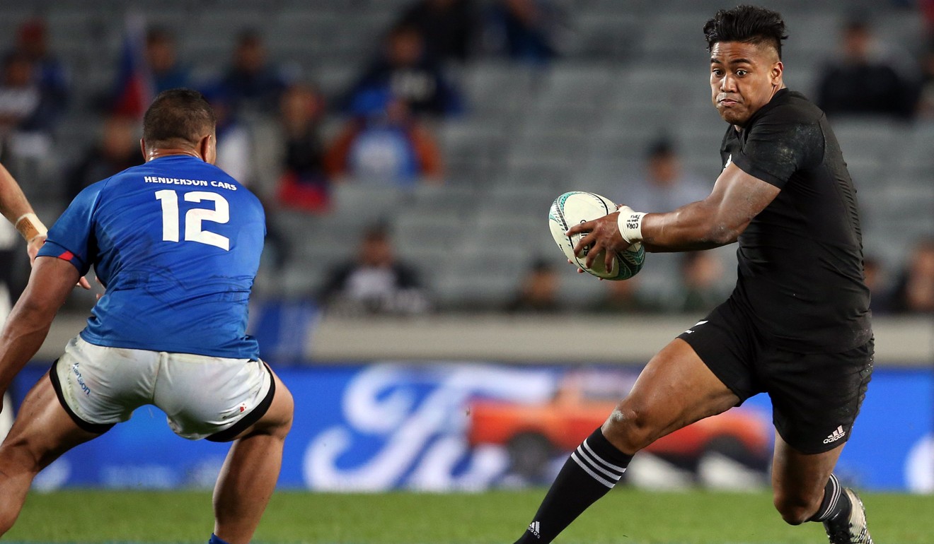 New Zealand’s Julian Savea runs with the ball past Samoa’s Alapati Leiua during the test at Eden Park in Auckland on October 31. Photo: AFP