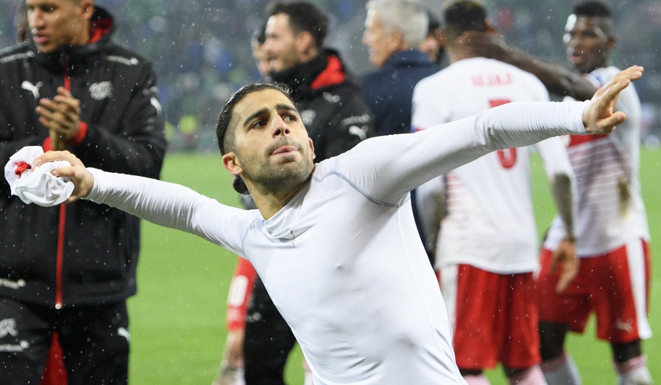 Switzerland's Ricardo Rodriguez celebrates his side’s victory. Photo: EPA