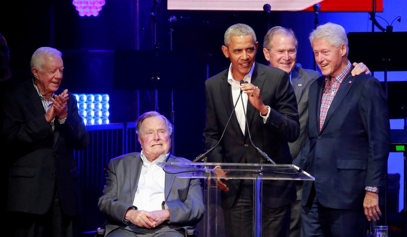 Former US presidents Jimmy Carter, George H.W. Bush, Barack Obama, George W. Bush and Bill Clinton speak during a benefit for hurricane relief in College Station, Texas, on October 21. Trump has frequently blamed his predecessors, especially Obama, Clinton and George W. Bush, for issues including the trade deficit with China. Photo: Reuters