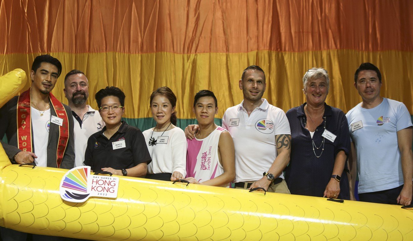 EOC legal counsel Peter Reading (right) poses with Federation of Gay Games site inspector David Killian (second left), members of the Hong Kong bidding team and others, as federation officials conclude a site inspection of Hong Kong, on June 21. Photo: Xiaomei Chen