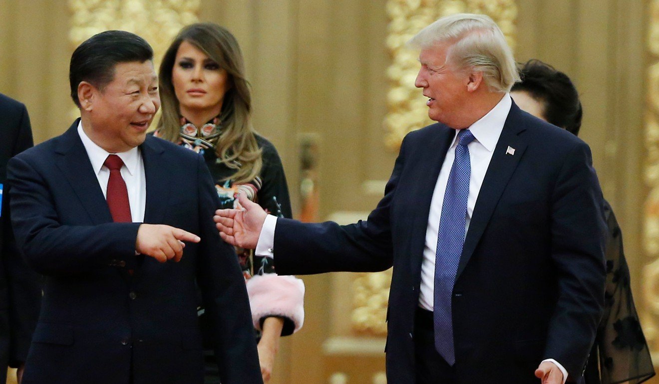 US President Donald Trump (right) talks to China’s President Xi Jinping as they arrive for a state dinner at the Great Hall of the People in Beijing last week. Human rights appear not to have been discussed during Trump’s visit to China. Photo: AFP
