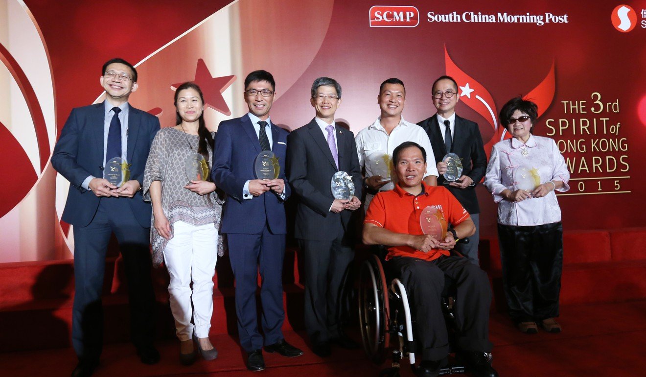 Foo Yuen-wai (front) with the other award recipients at the SCMP Spirit of Hong Kong Awards ceremony in 2015. Photo: Dickson Lee