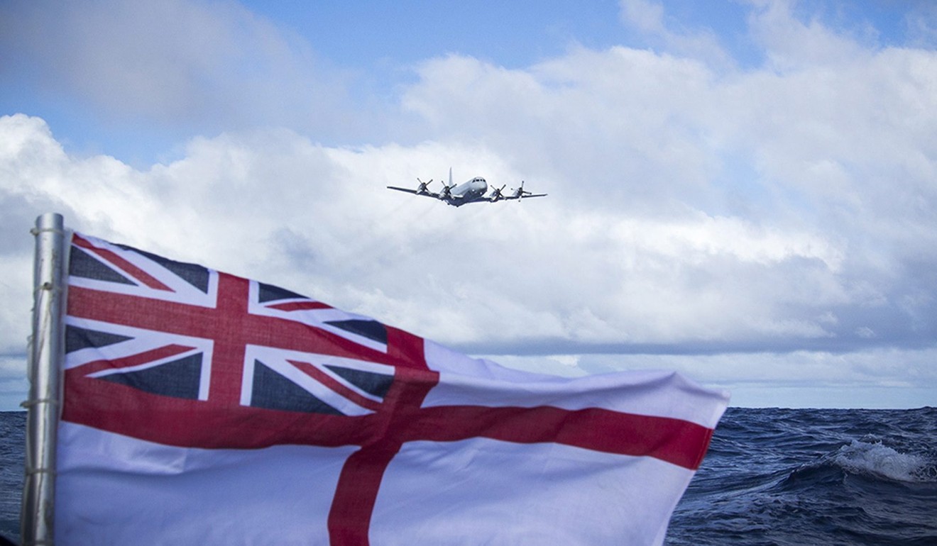 File photo of an AP 3C Orion from the Royal Australian Air Force seen from a British navy boat. Photo: EPA