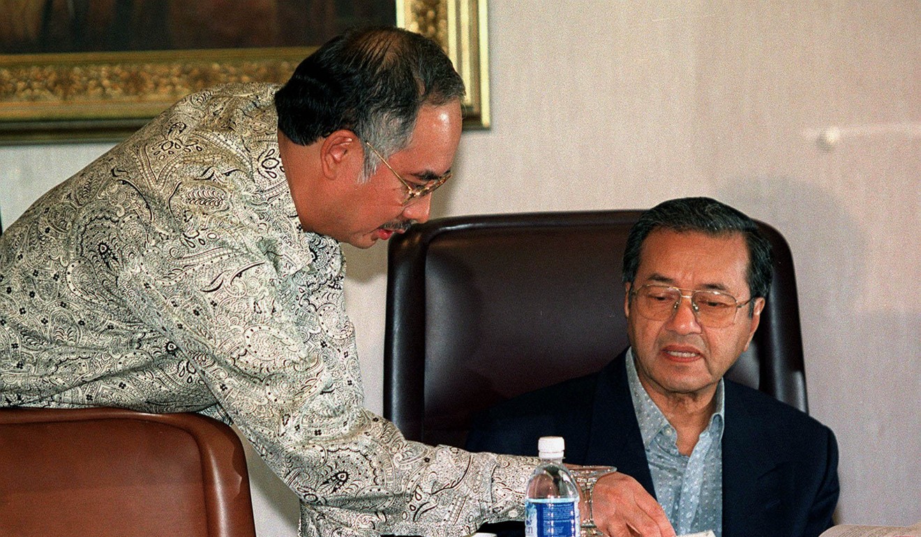 Malaysian Prime Minister Mahathir Mohamad (right) with Najib Razak, when Najib was education minister in 1998. Photo: Reuters
