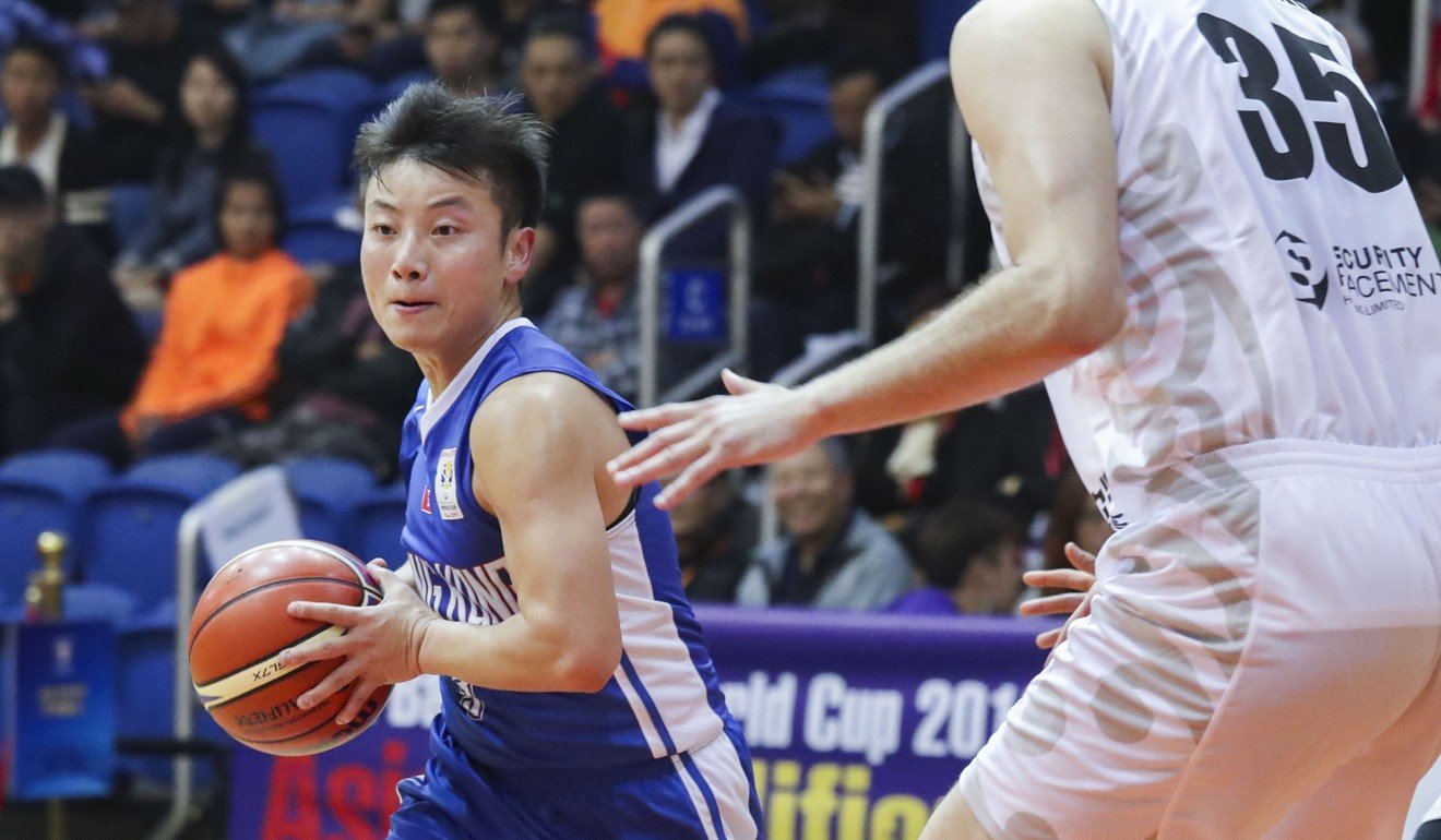 Hong Kong’s Liang Man-hung finds support from his teammates.