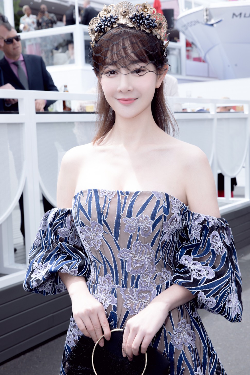 Zhang wears an off-the-shoulder embroidered Elliatt dress at the Spring Racing Carnival in Melbourne.