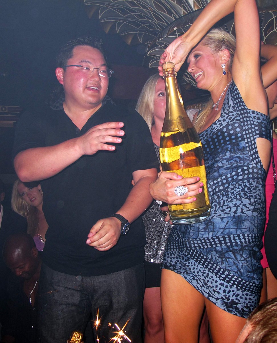 Low Taek Jho, aka Jho Low, with American socialite Paris Hilton at a nightclub in St Tropez, France, in 2010.