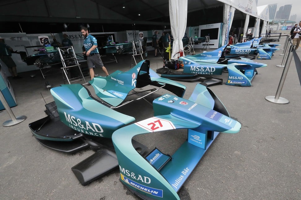Motorcade staff prepare the cars for the Hong Kong E-Prix in Central Harbourfront.