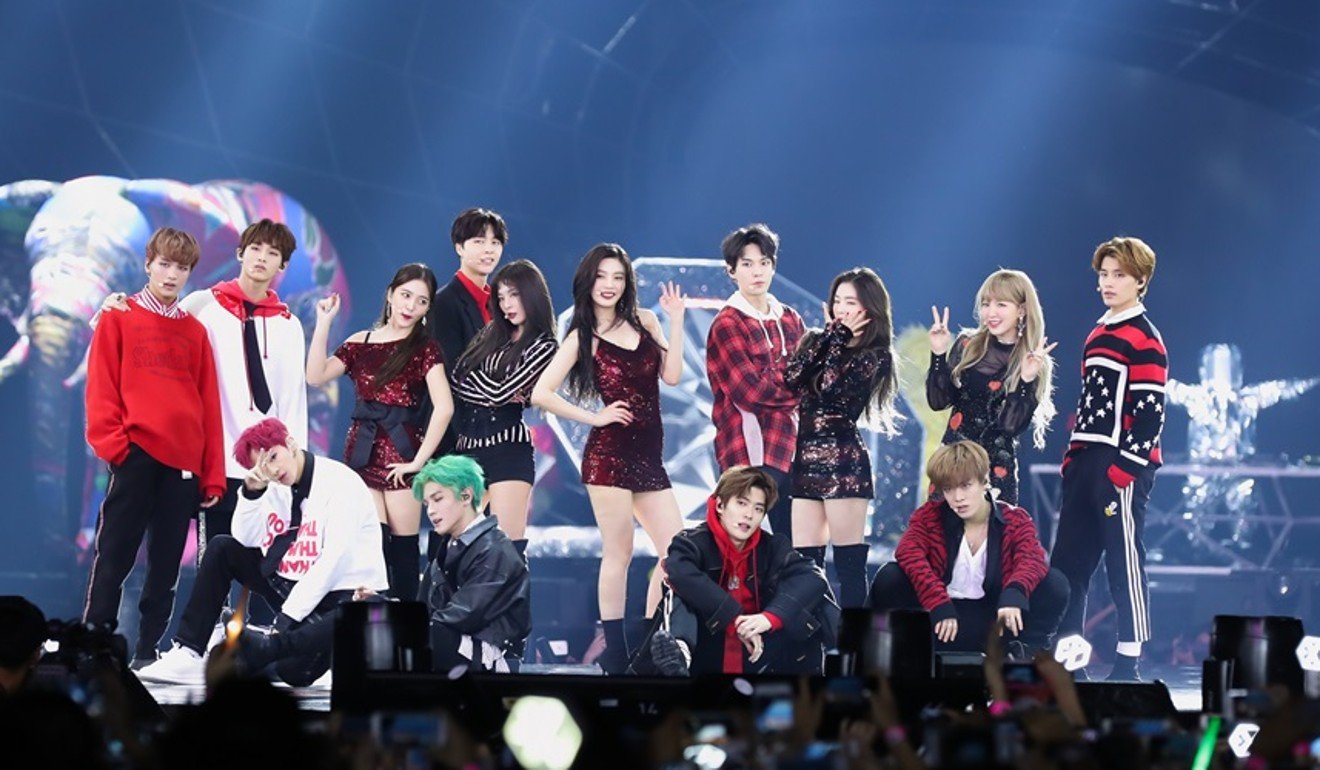 Best new Asian artist winner, NTC 127 perform with best female group winner, Red Velvet. Photo: Handout