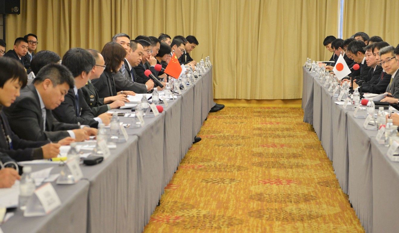 Chinese and Japanese diplomats pictured during their talks in Shanghai on Tuesday to discuss maritime issues. Photo: Kyodo