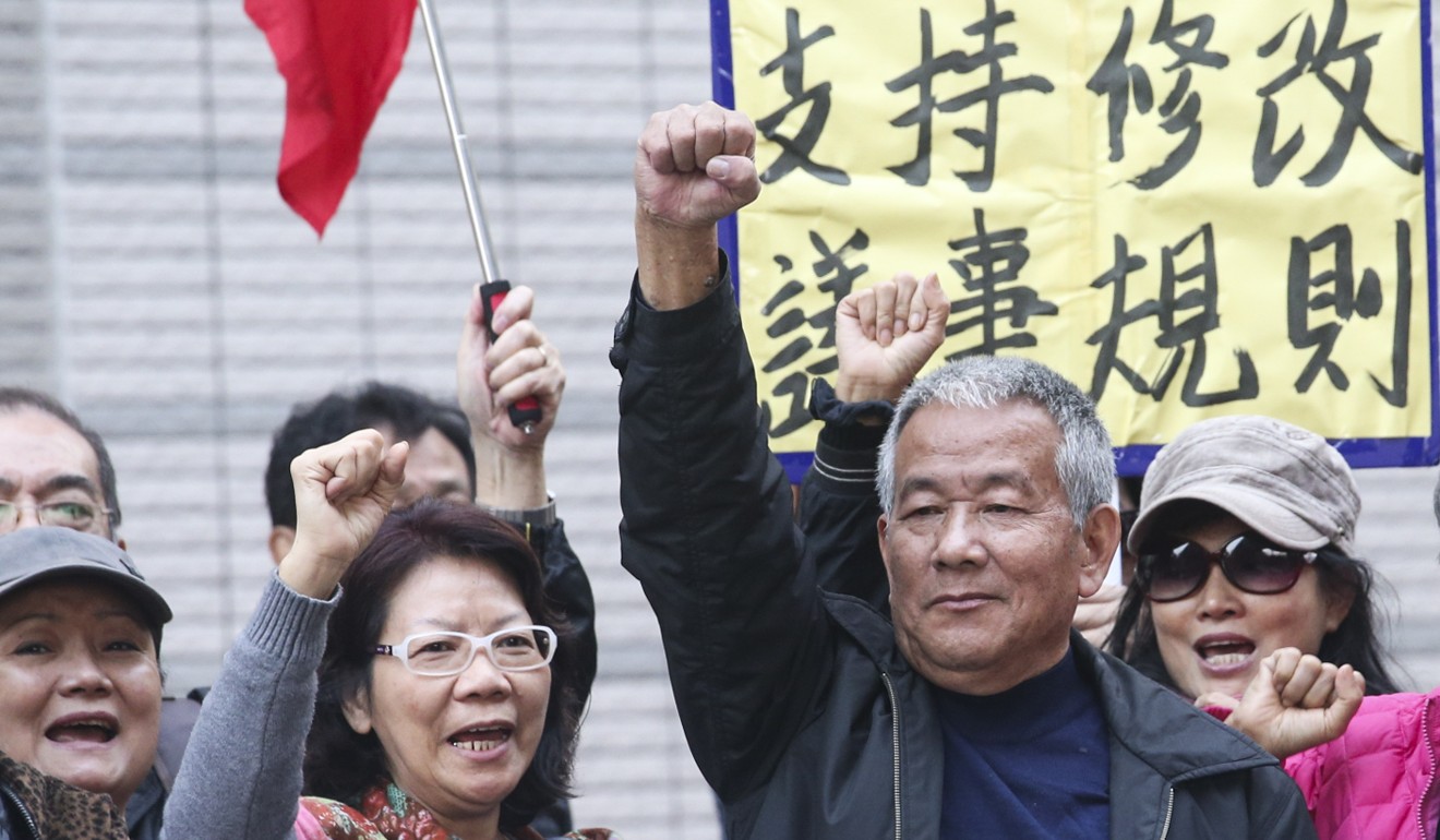 Lam Kam-sheung (left), 69, and Tong Fat-cheung (right), 72, appear at the West Kowloon Court on Wednesday. Photo: David Wong