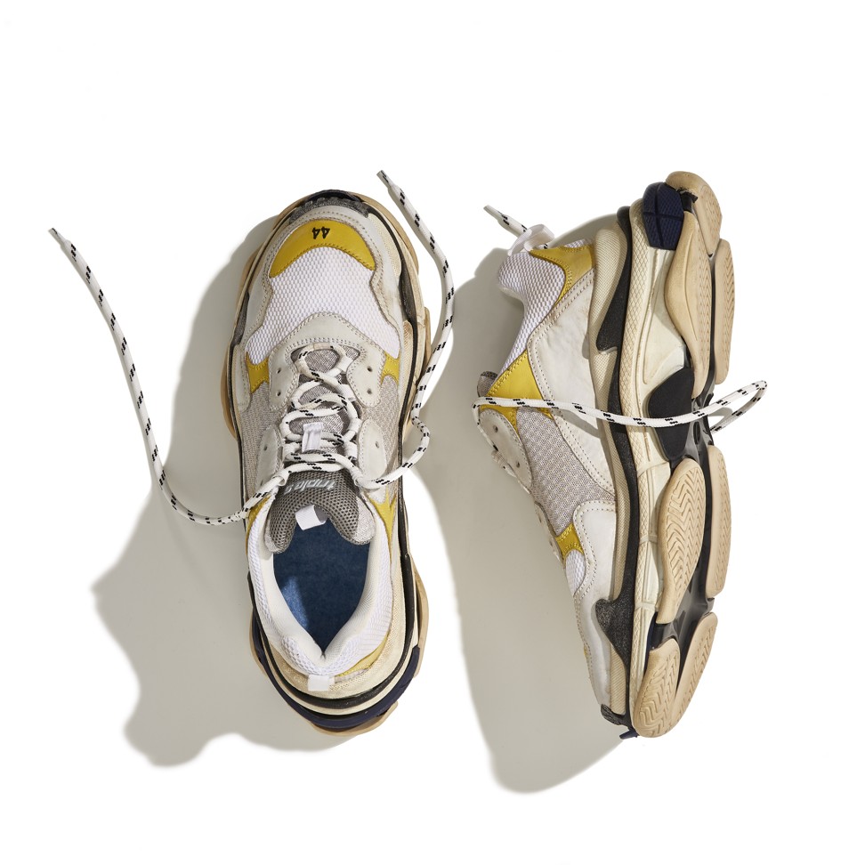 Balenciaga Triple S DSM- exclusive sneakers. Balenciaga is one of the luxury fashion brands that have been inspired by streetwear.