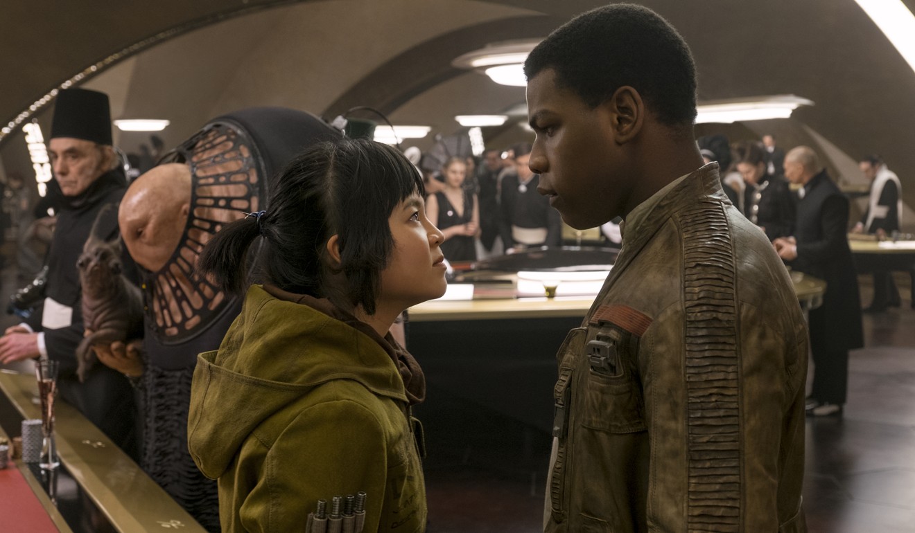 Kelly Marie Tran as Rose and John Boyega as Finn in a still from Star Wars: The Last Jedi. Photo: David James