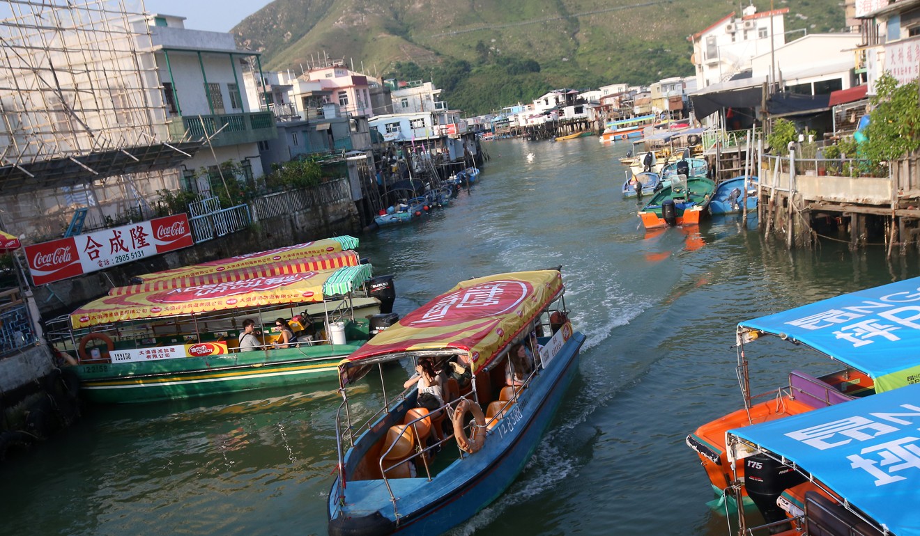 Small ferries, known as kaito, transport passengers between outlying islands. Photo: David Wong