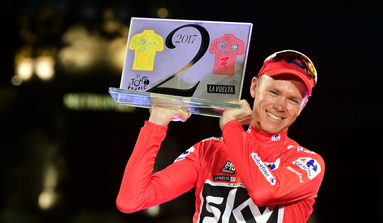 Tour de France winner Chris Froome celebrates making it a double with his La Vuelta triumph.