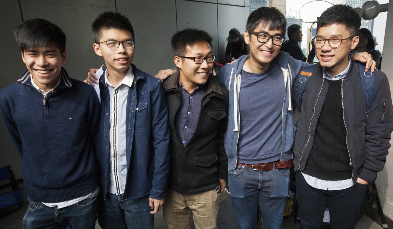 Pro-democracy activists (from left) Lester Shum, Joshua Wong, Raphael Wong, Alex Chow and Nathan Law gather outside Hong Kong’s High Court before their sentencing on contempt of court charges in Hong Kong, on December 7. The activists were being tried for obstructing government bailiffs during the clearance of protesters during the final days of the Occupy protests in 2014. Photo: EPA-EFE