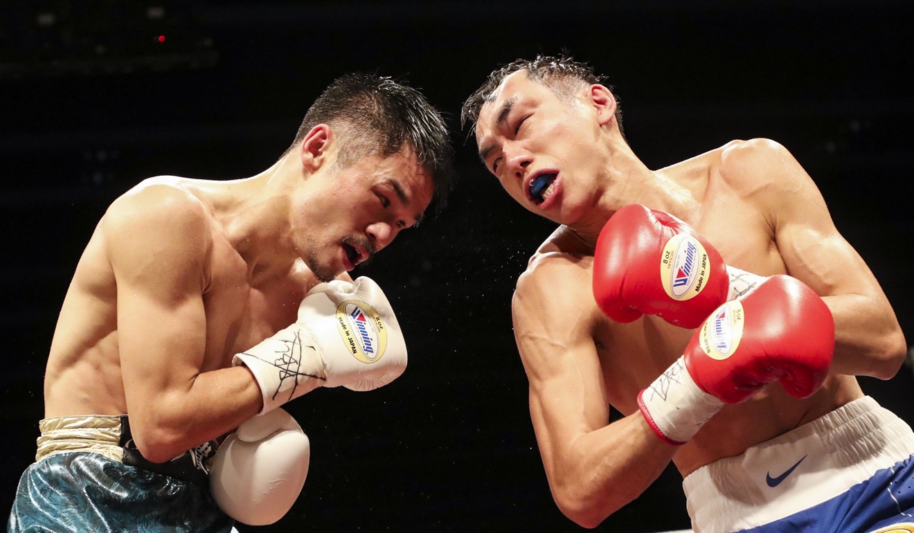 Rex Tso (right) dukes it out with Japan’s Kohei Kono in October. Photo: Edward Wong