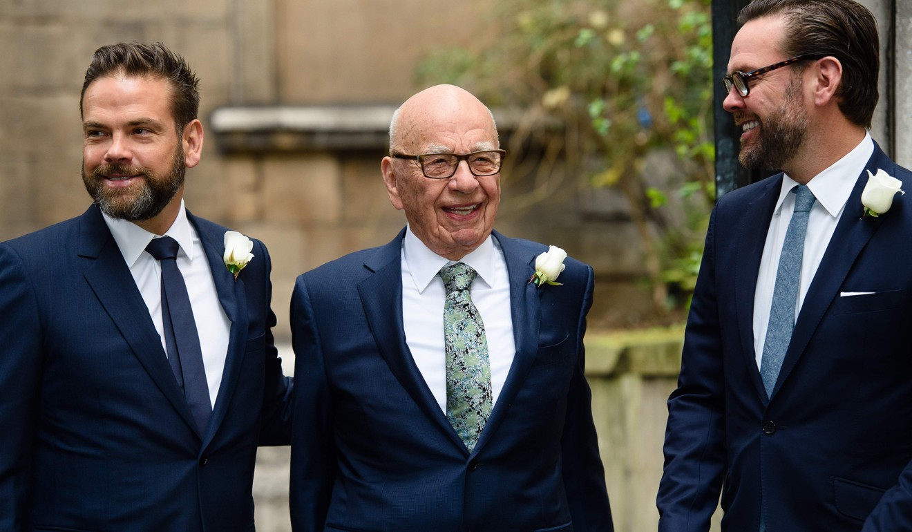 Rupert Murdoch (centre) flanked by his sons Lachlan (left) and James arriving at St Bride's church on Fleet Street in central London to attend a ceremony of celebration a day after the official marriage of Rupert Murdoch and former US model Jerry Hall. Photo: AFP