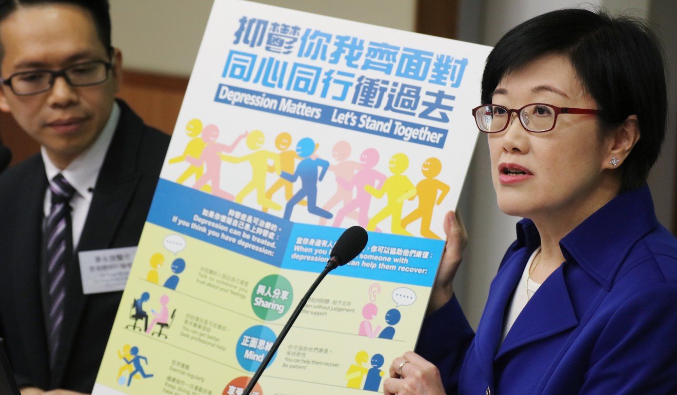 Hong Kong Director of Health Constance Chan Hon-yee addresses a press conference on World Mental Health Day, as Ivan Mak, chairman of the Public Awareness Committee at the Hong Kong College of Psychiatrists, looks on, in Mong Kok on April 7. Photo: Felix Wong
