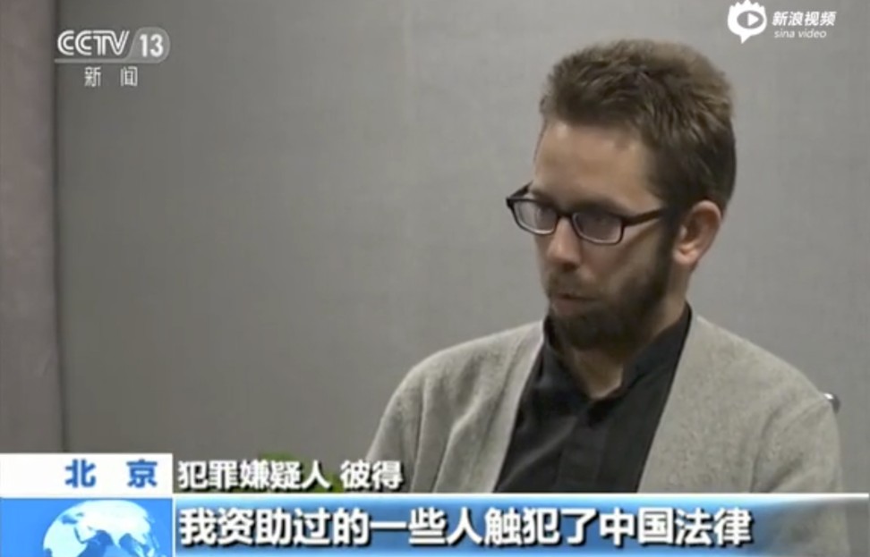 Swedish rights activist Peter Dahlin, admits to his crimes on China state television. Picture: SCMP