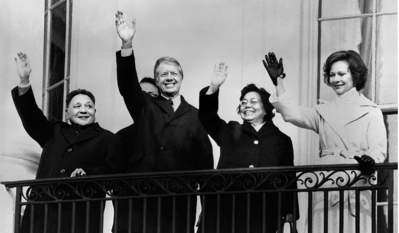 Vice-premier Deng Xiaoping and US president Jimmy Carter, with their wives Zhuo Lin and Rosalynn Carter, wave from a balcony at the White House in January 1979. Photo: AFP