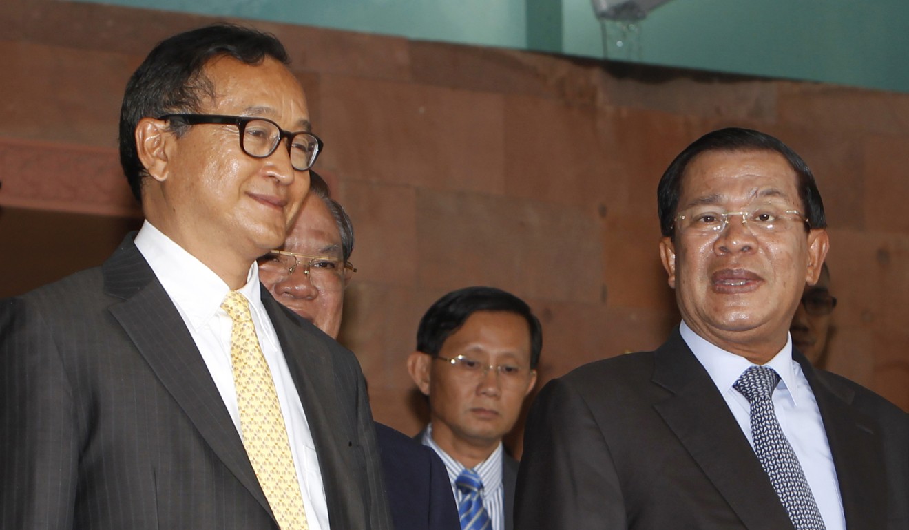Cambodian Prime Minister Hun Sen with main opposition leader at the time Sam Rainsy in 2012. Photo: AP