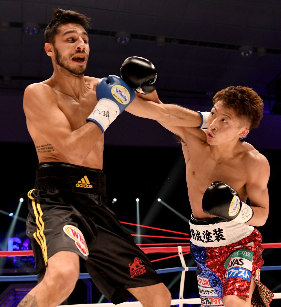 Naoya Inoue crushes Yoan Boyeaux with a powerful right hand. Photo: AFP