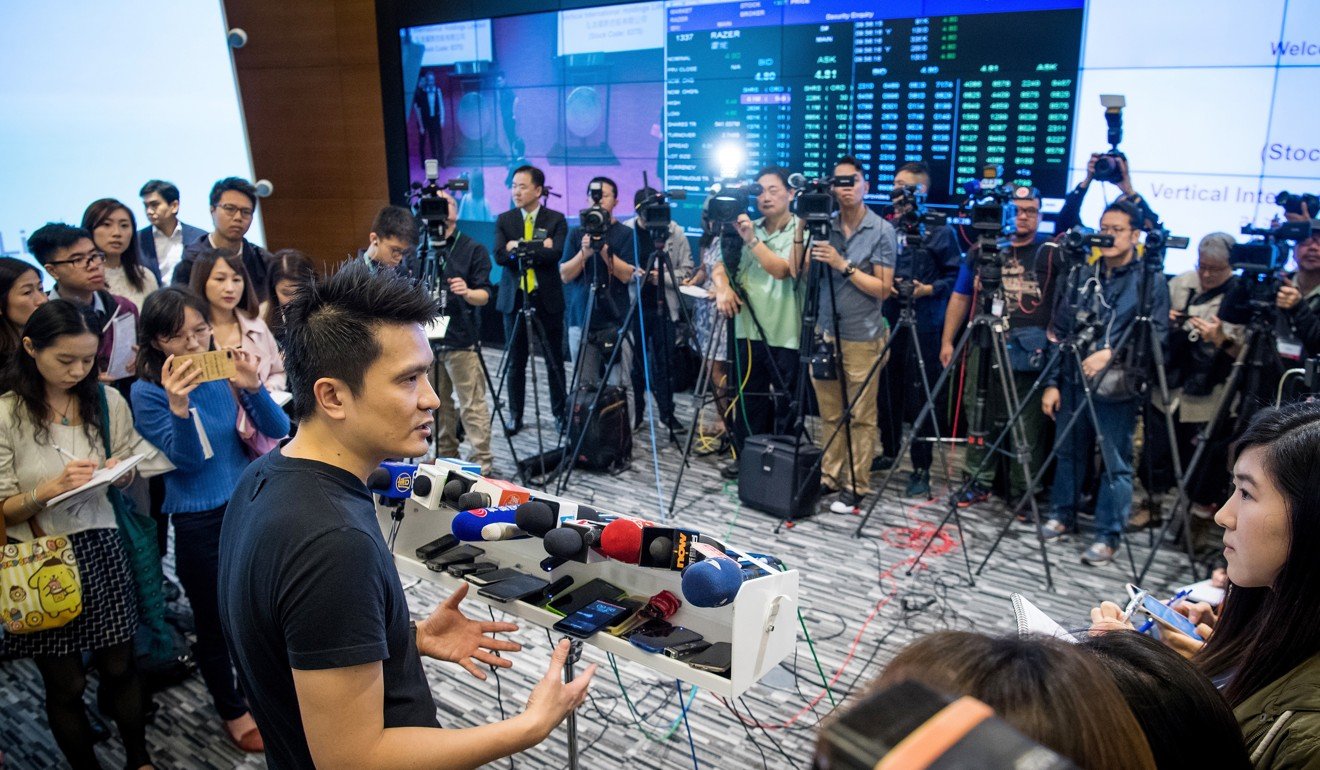 Billionaire Tan Min-liang, chief executive officer and co-founder of Razer, speaks to the media after the company’s listing ceremony at the Hong Kong stock exchange on November 13. Photo: Bloomberg