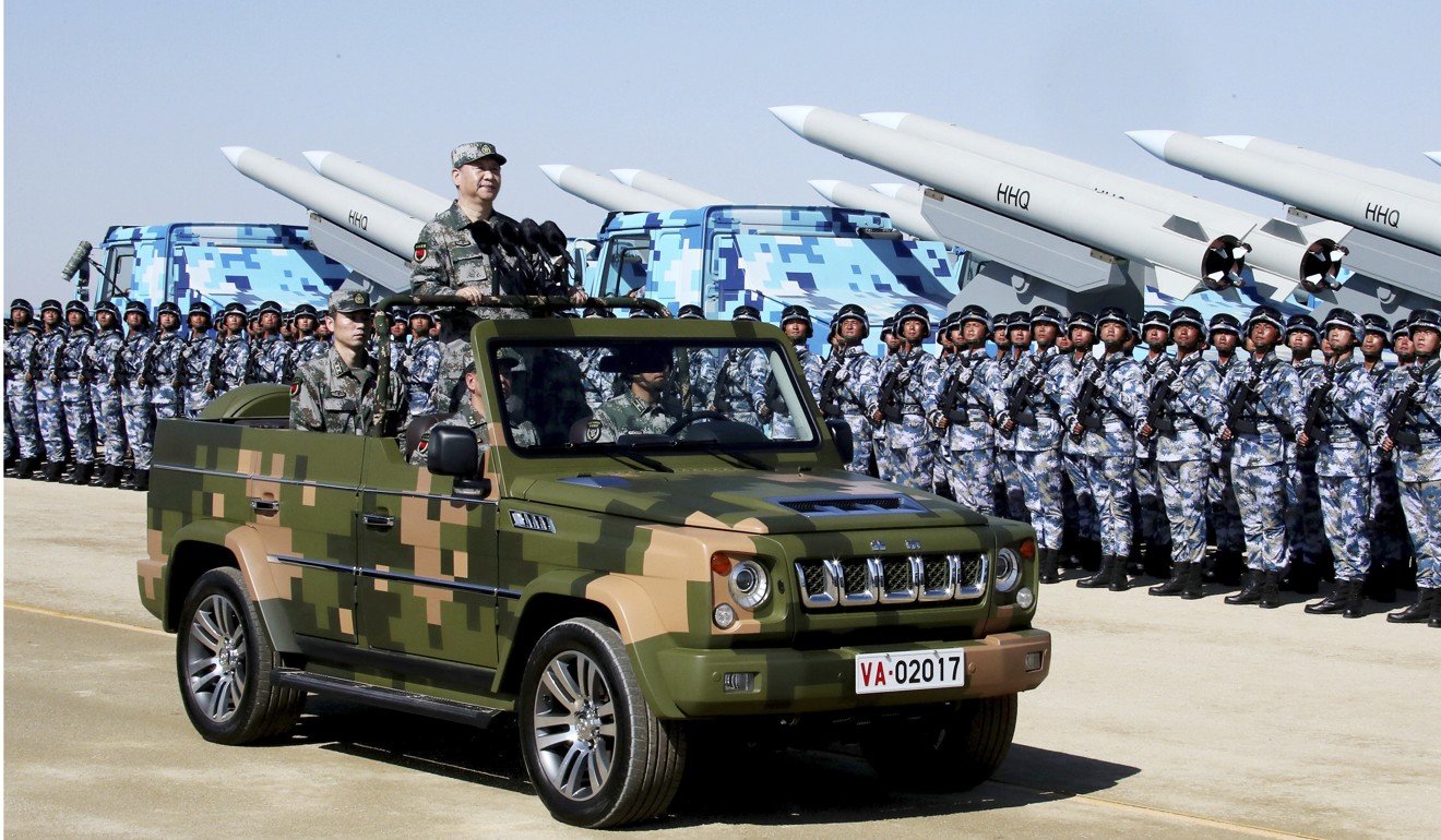 President Xi Jinping inspects People's Liberation Army troops and equipment during a military parade at the Zhurihe training base in Inner Mongolia in July to commemorate the 90th anniversary of the founding of the PLA. Photo: Xinhua