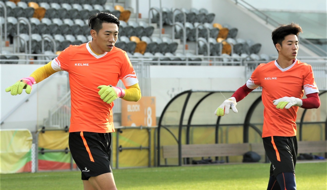 Guangdong goalkeeper Hou Yu trains with his fellow goalies at Mong Kok Stadium.