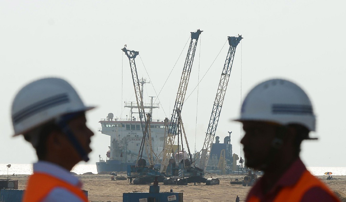 Pumps dredge sand to reclaim land at the site of a Chinese-funded US$1.4 billion reclamation next to Colombo's main seaport. Photo: AFP