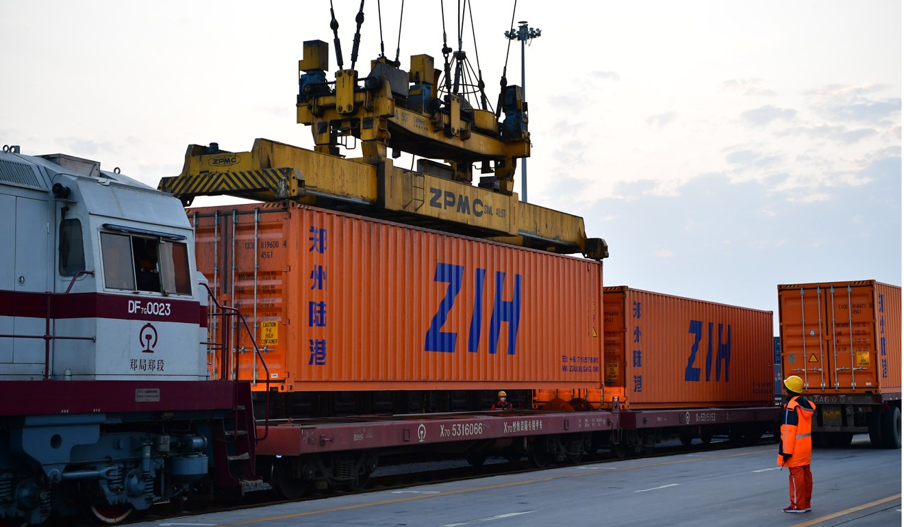 A container is loaded onto a freight train in Zhengzhou, Henan province, on December 25, the day the 1,000th freight train bound for Europe left the city. Photo: Xinhua
