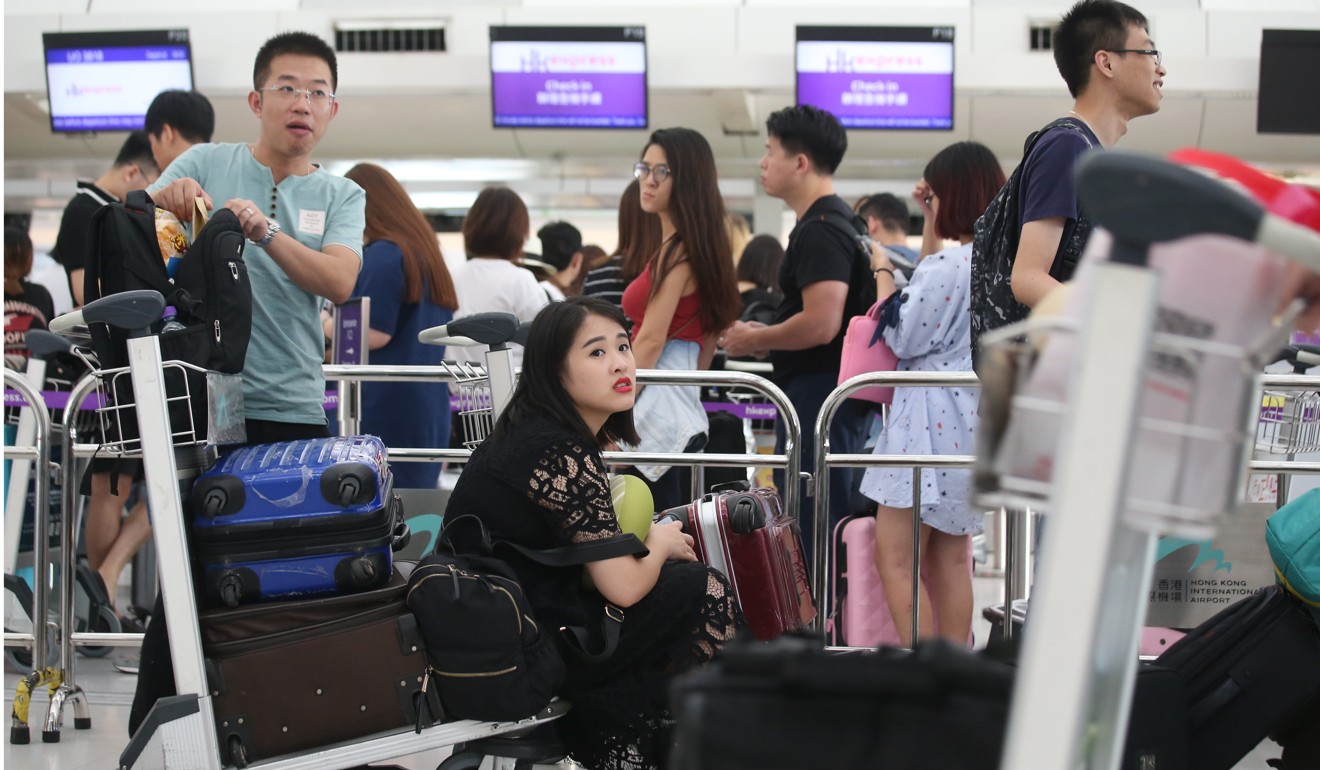 Here is one practice to build your connection with others: at the airport, pick someone in your field of view. Focus on them as a person with desires and challenges – just like you. Repeat internally a sincere wish that they be happy and healthy, just like you would wish a loved one to be happy and healthy. Photo: K. Y. Cheng